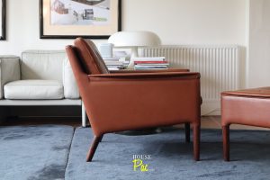 House of Pac - Kurt Ostervig Model 55 armchair and ottoman